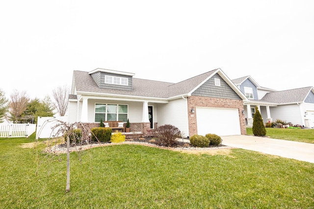 view of front of home featuring a front lawn and a garage