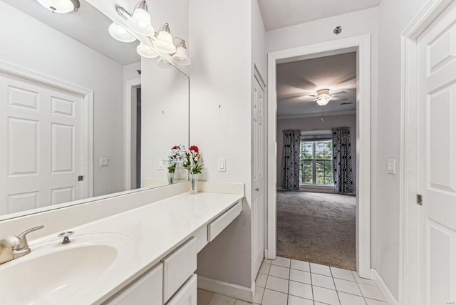 bathroom with ceiling fan, vanity, and tile patterned floors