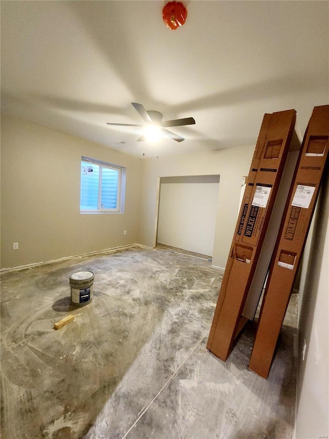 unfurnished room with ceiling fan