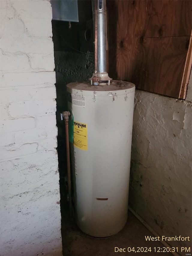 utility room with water heater