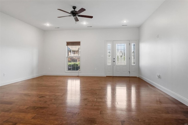 entryway with ceiling fan and dark hardwood / wood-style floors