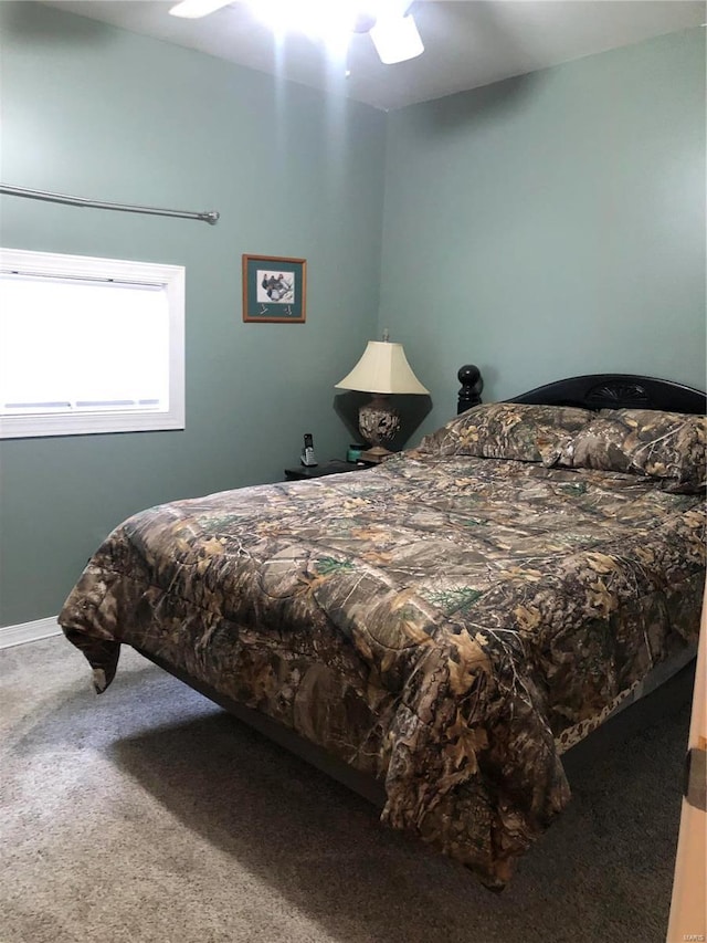 bedroom featuring carpet flooring and ceiling fan