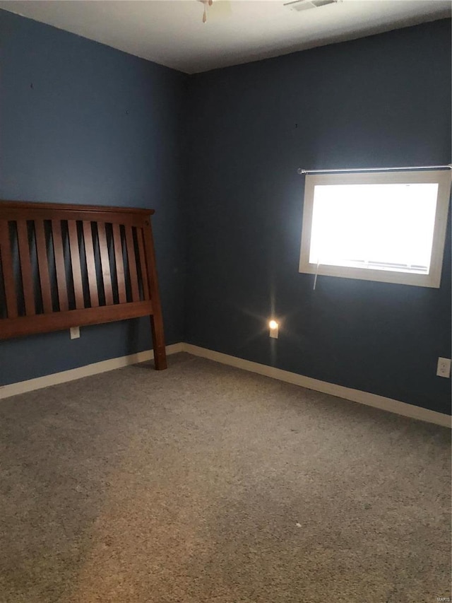 spare room with carpet