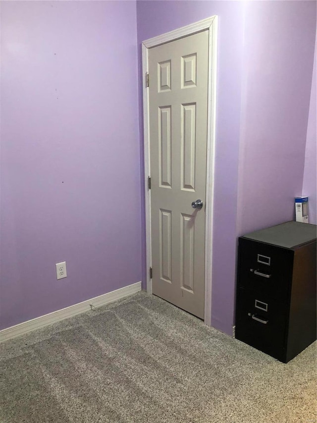 unfurnished bedroom with carpet floors