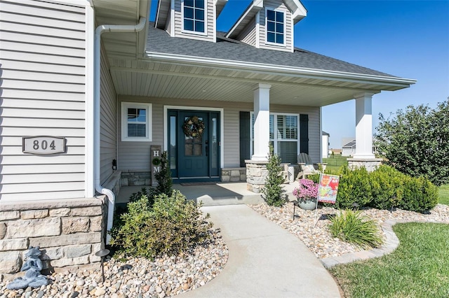 entrance to property with a porch