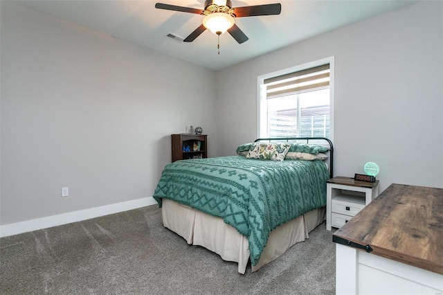 bedroom featuring dark colored carpet and ceiling fan