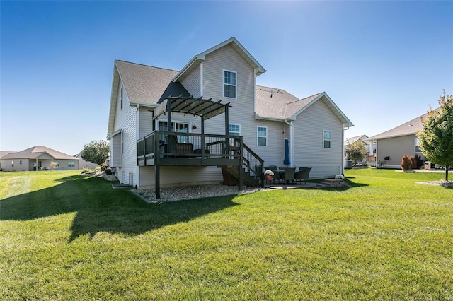 back of house with a yard, a deck, and a pergola