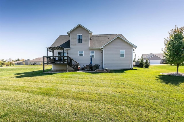 rear view of property featuring central AC, a yard, and a pergola