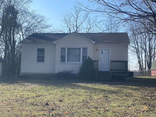 view of front of home with a front yard