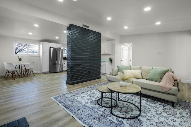 living room featuring light hardwood / wood-style floors