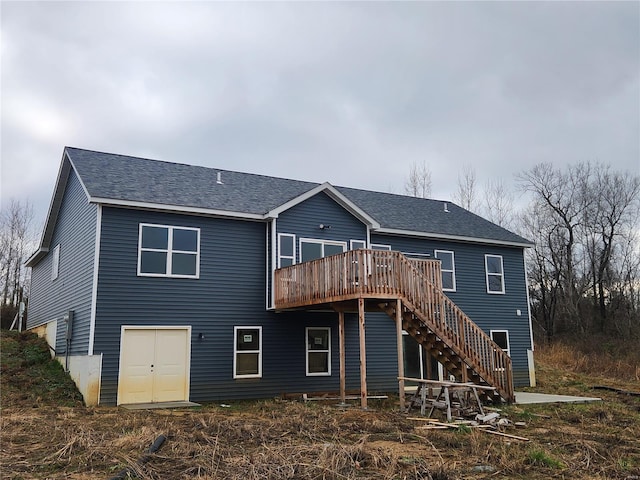 rear view of property with a deck