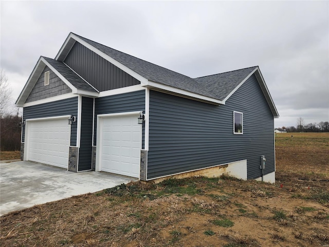 view of home's exterior with a garage