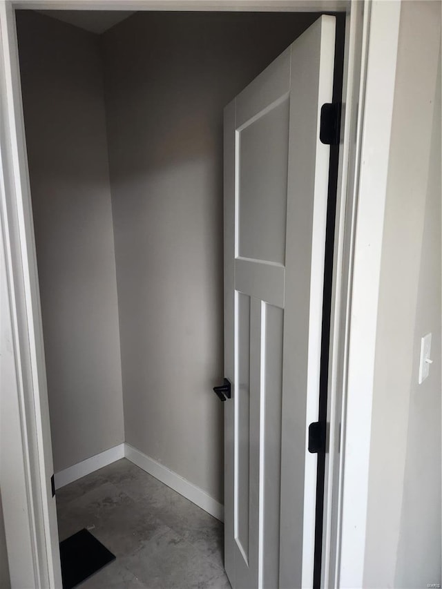 interior space featuring concrete flooring