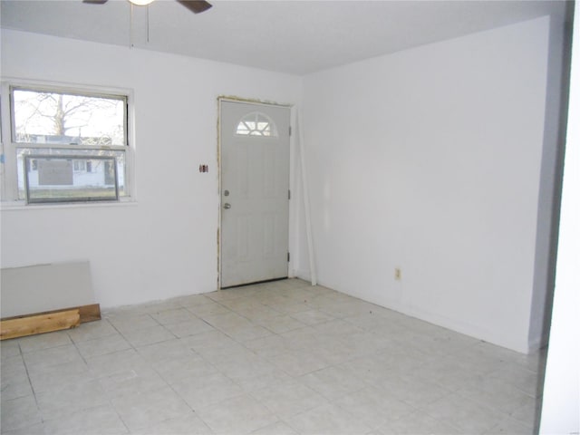 entrance foyer featuring ceiling fan