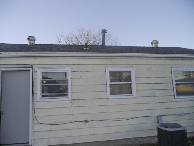 view of property exterior with central air condition unit