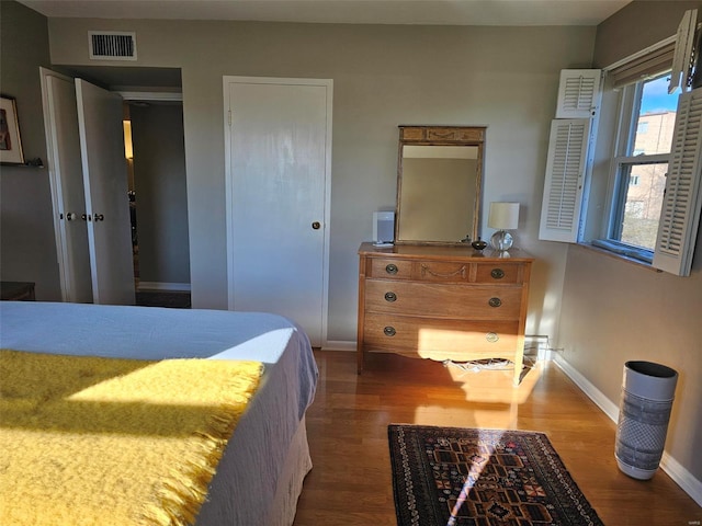 bedroom featuring hardwood / wood-style flooring