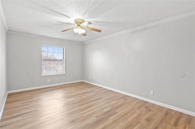 unfurnished room with ceiling fan, light wood-type flooring, a textured ceiling, and ornamental molding