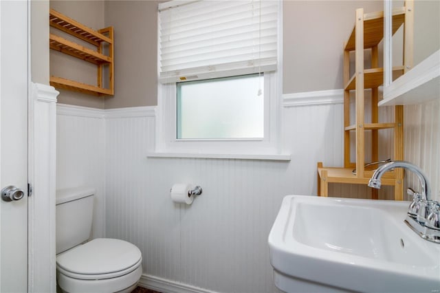 bathroom with sink and toilet