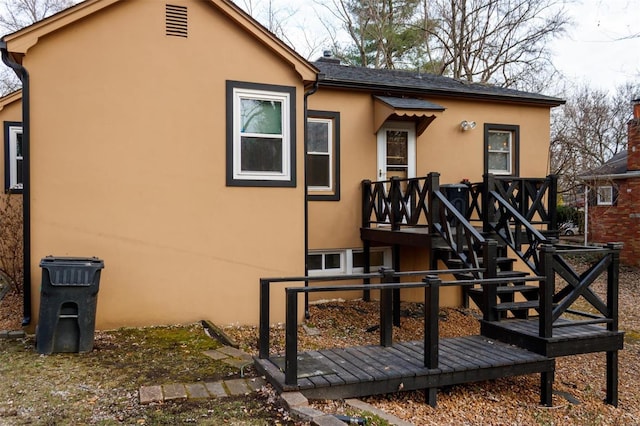 rear view of house with a deck