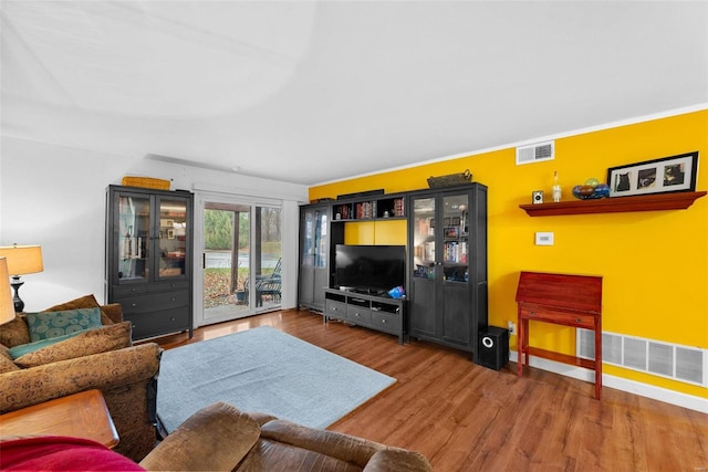 living room with hardwood / wood-style flooring