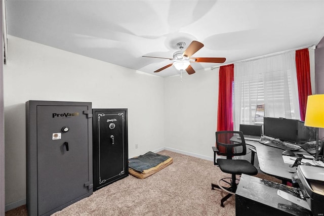 office space with carpet and ceiling fan