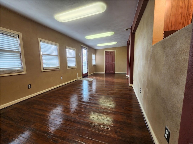 entrance foyer featuring dark hardwood / wood-style floors