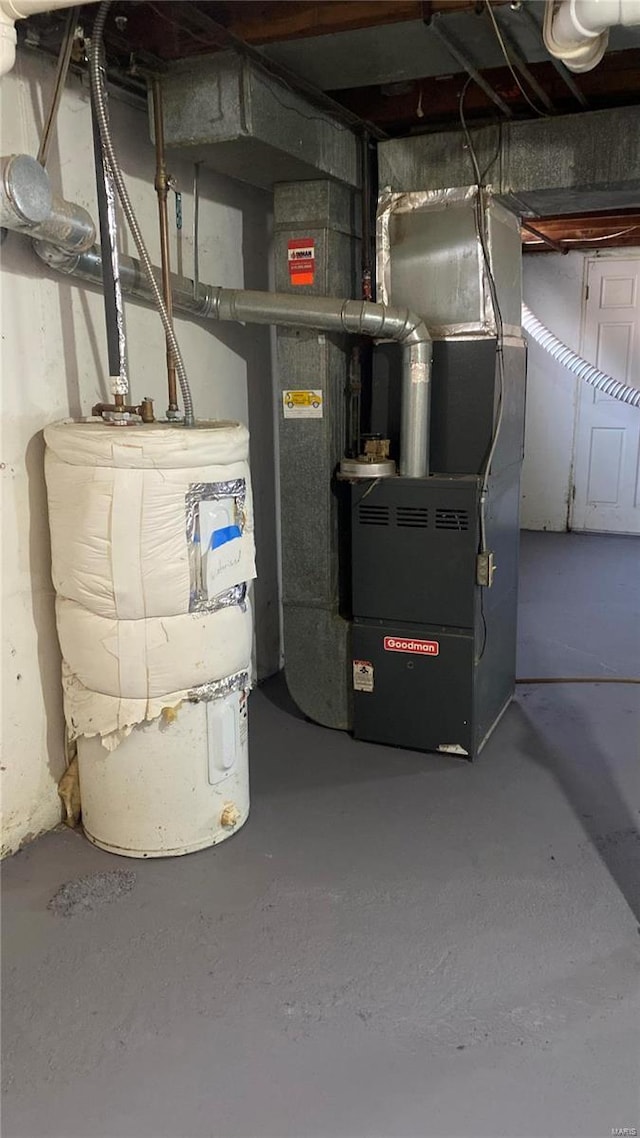 utility room with water heater