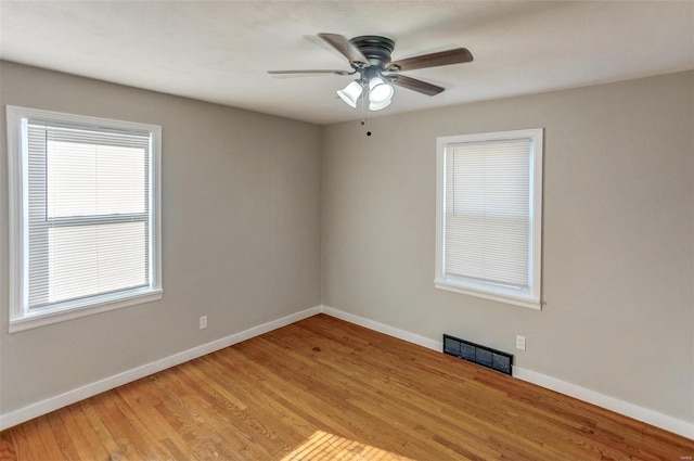 unfurnished room featuring ceiling fan and light hardwood / wood-style floors