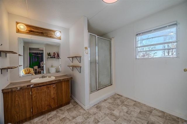 bathroom featuring vanity and walk in shower