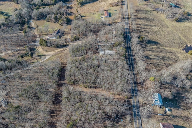 birds eye view of property featuring a rural view