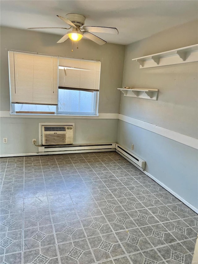 spare room featuring a wall unit AC, ceiling fan, and a healthy amount of sunlight