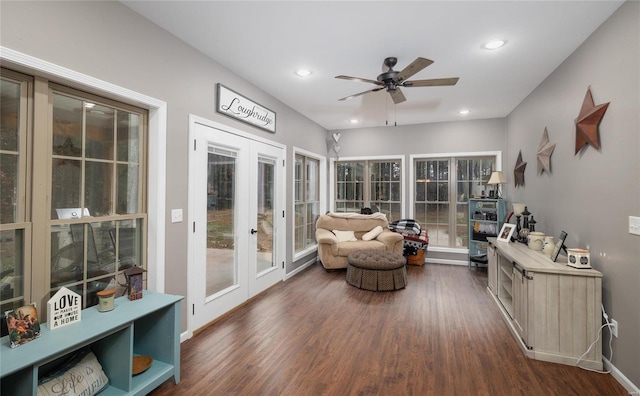 sunroom featuring french doors, ceiling fan, and a healthy amount of sunlight