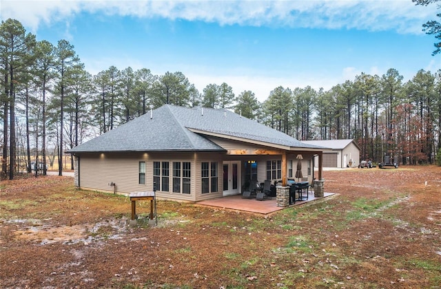 rear view of house with a patio area