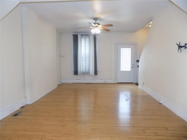 interior space featuring ceiling fan and light wood-type flooring