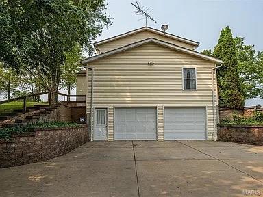 view of home's exterior featuring a garage