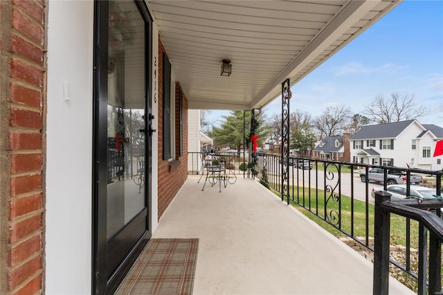 balcony featuring a porch