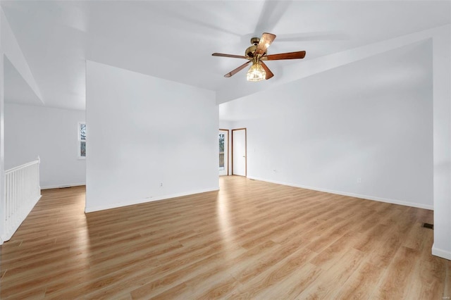 spare room featuring ceiling fan and light hardwood / wood-style floors