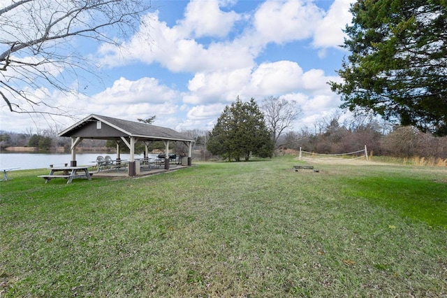 view of yard featuring a gazebo and a water view