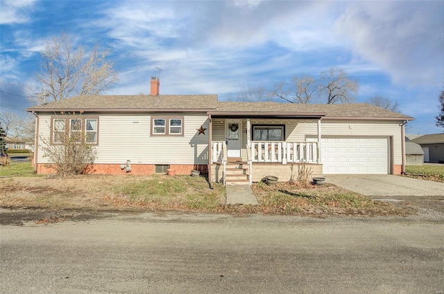 single story home with central air condition unit, covered porch, and a garage