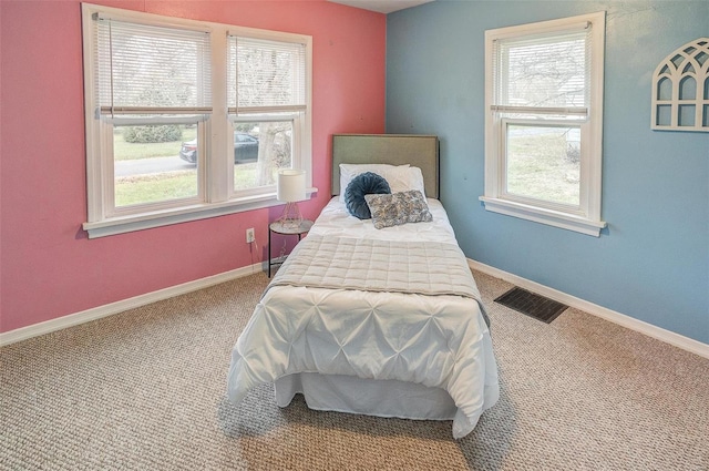 bedroom featuring carpet