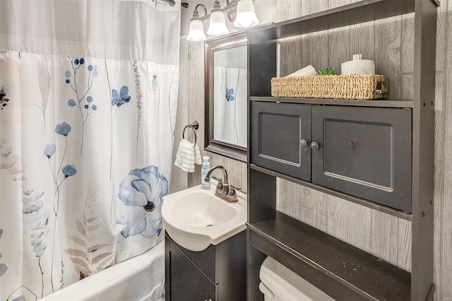 bathroom with vanity and shower / bath combo with shower curtain