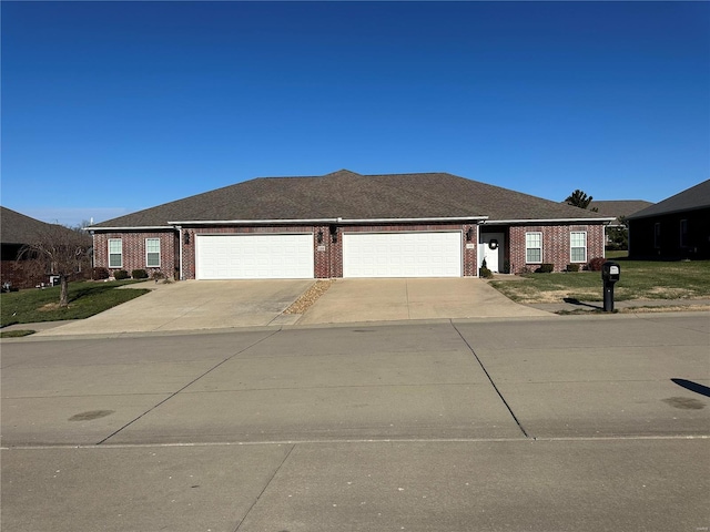 ranch-style home with a garage