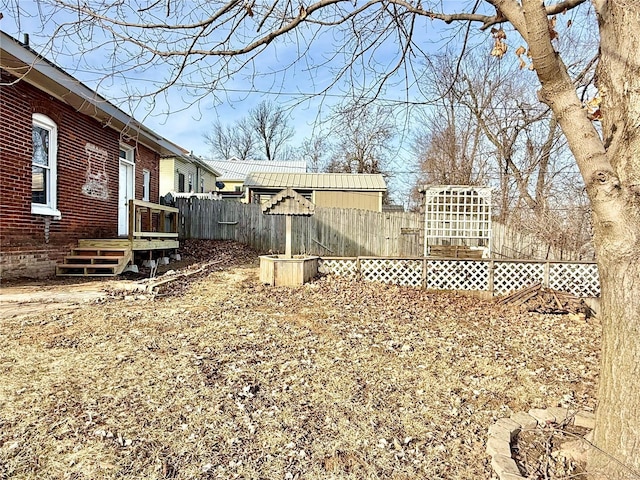 view of yard with fence