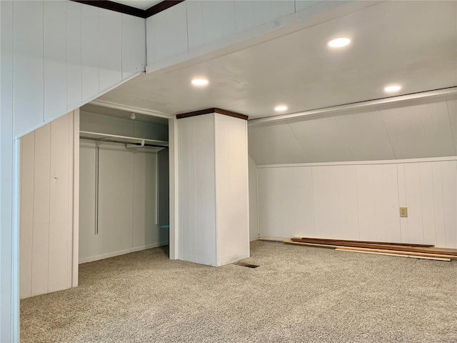 interior space with visible vents, carpet floors, recessed lighting, a closet, and a baseboard heating unit