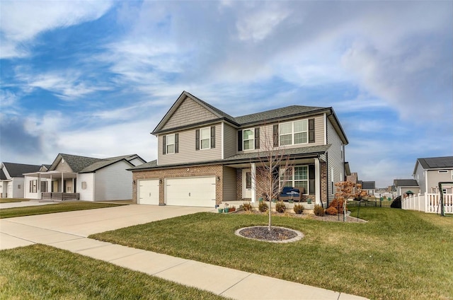 craftsman house featuring a front lawn and a garage