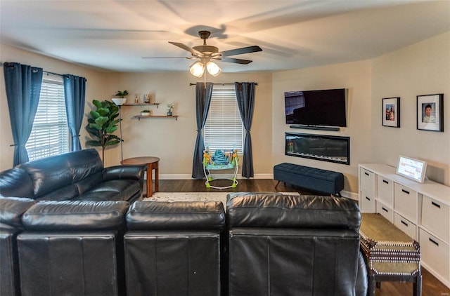 living room with hardwood / wood-style flooring and ceiling fan