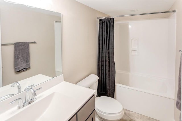 full bathroom featuring shower / bath combo with shower curtain, vanity, and toilet