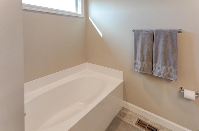 bathroom featuring a bathtub