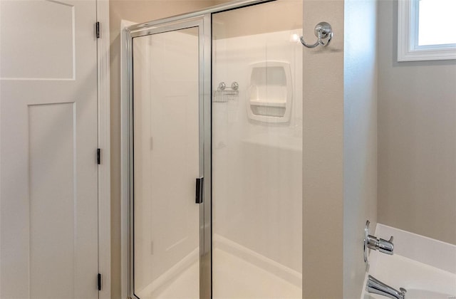 bathroom with an enclosed shower