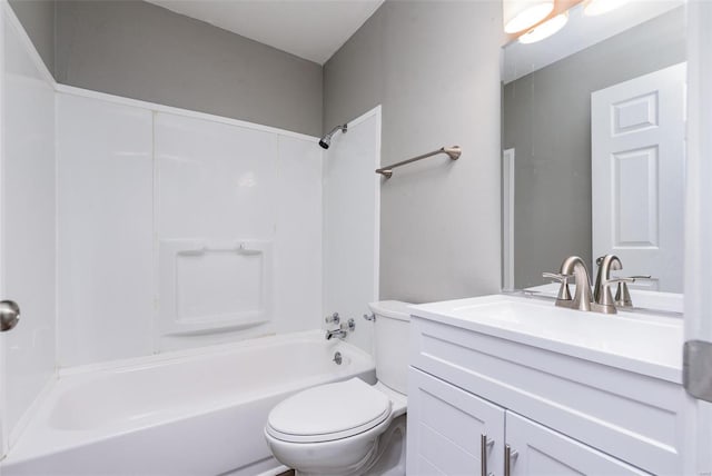 full bathroom with vanity,  shower combination, and toilet